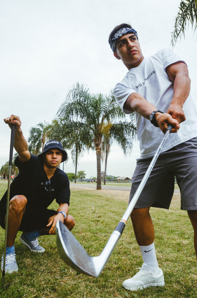 Men Playing Golf